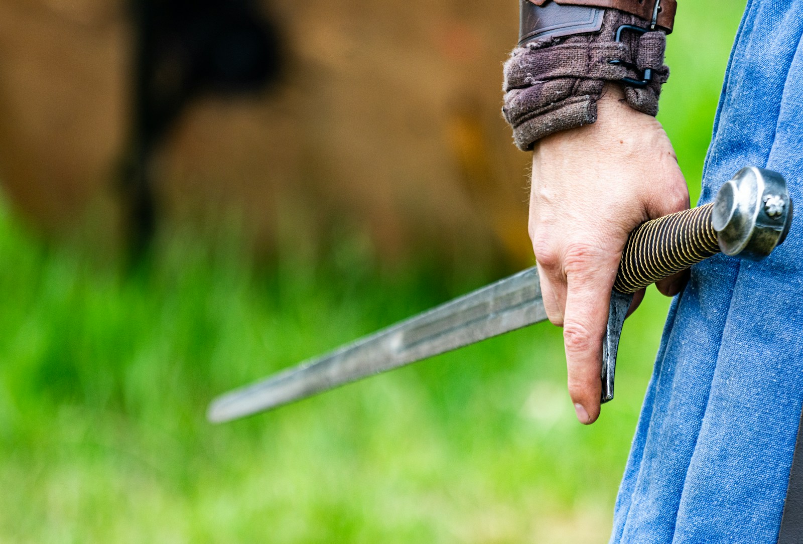 a person holding a sword in their hand